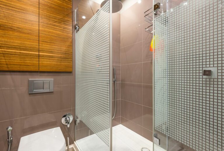 clean acrylic shower walls
