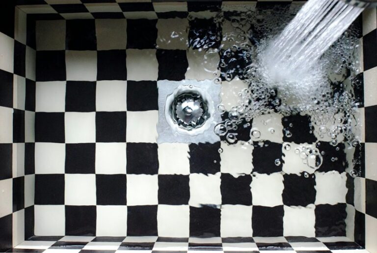 cleaning clogged drain tile