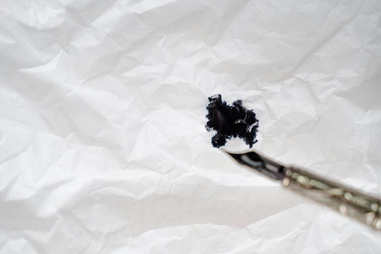 remove black ink from clothes