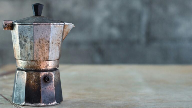 remove burnt milk from glass stovetop