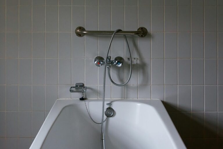 remove mortar from bathtub